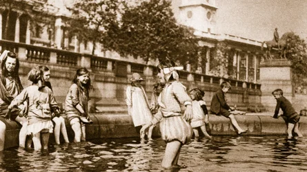 West End children cooling themselves in a fountain at Trafalgar Square during a heat wave